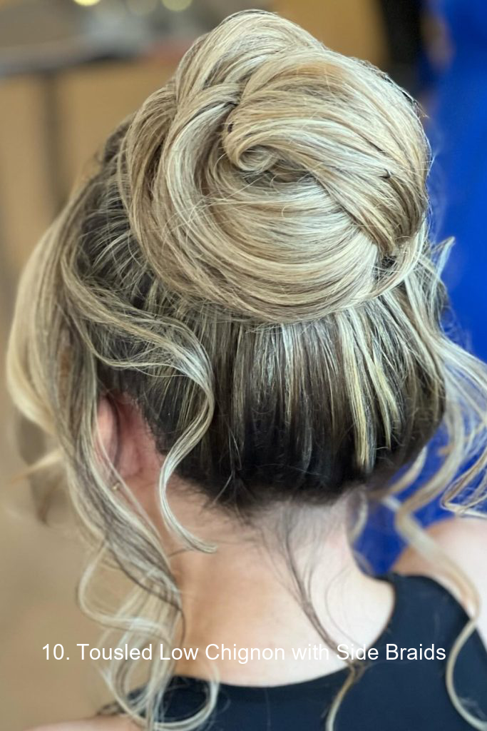 10. Tousled Low Chignon with Side Braids