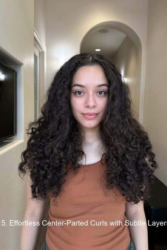 15. Effortless Center-Parted Curls with Subtle Layers