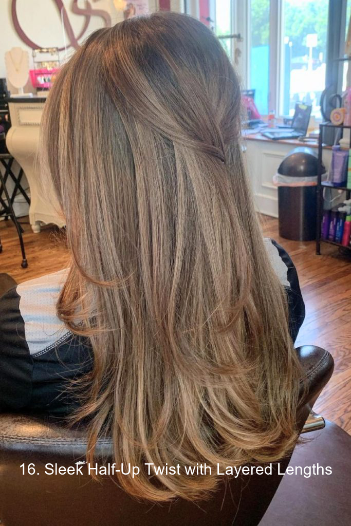 16. Sleek Half-Up Twist with Layered Lengths