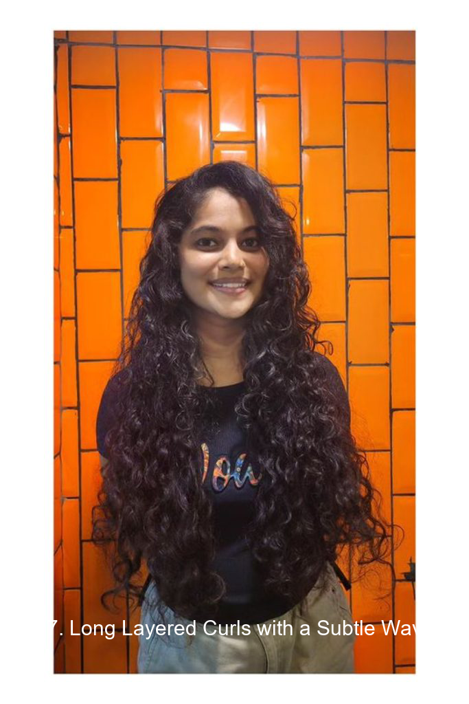 17. Long Layered Curls with a Subtle Wave