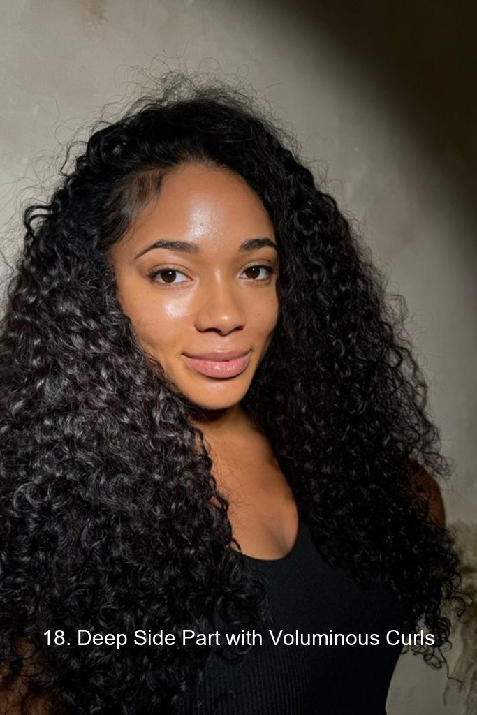 18. Deep Side Part with Voluminous Curls