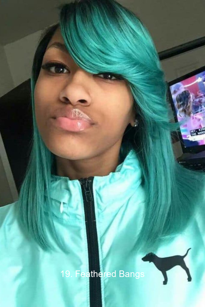 19. Feathered Bangs