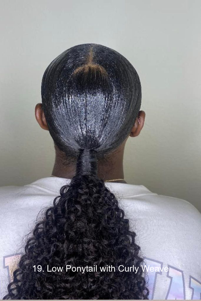 19. Low Ponytail with Curly Weave