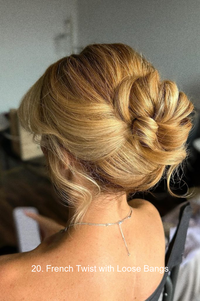 20. French Twist with Loose Bangs
