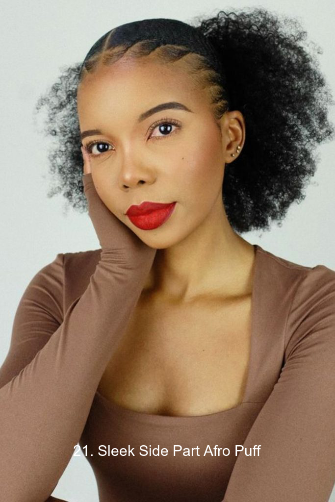 21. Sleek Side Part Afro Puff