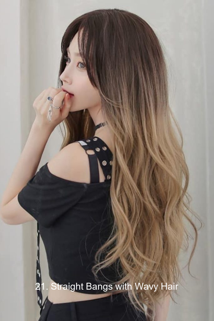 21. Straight Bangs with Wavy Hair