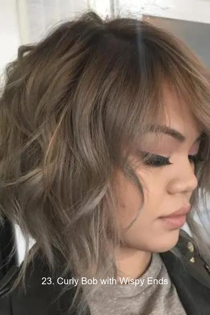 23. Curly Bob with Wispy Ends