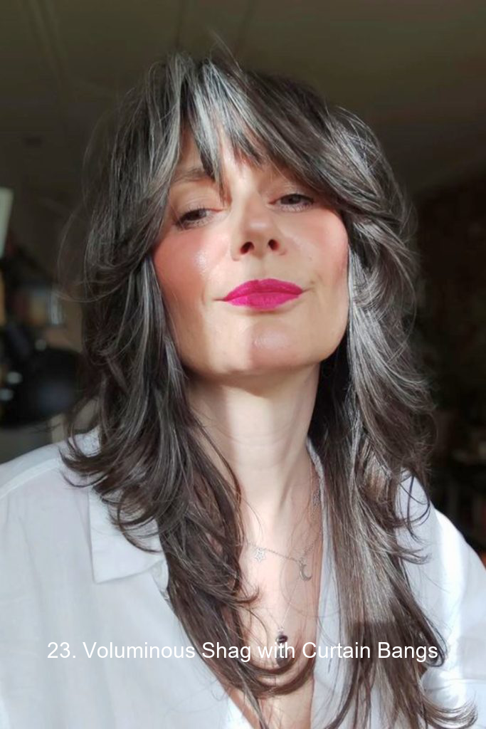 23. Voluminous Shag with Curtain Bangs