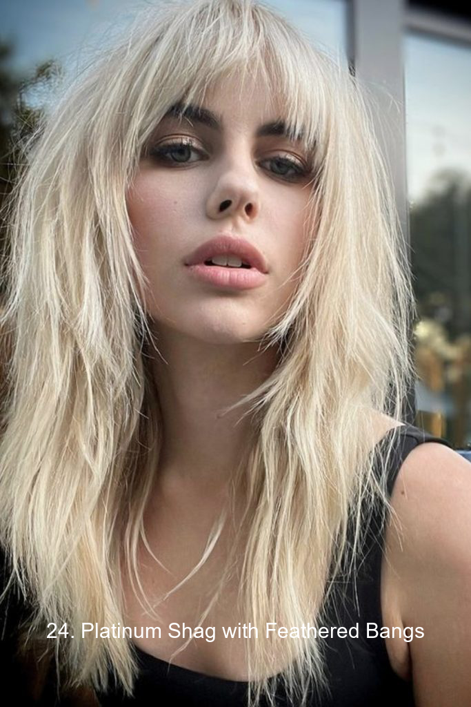 24. Platinum Shag with Feathered Bangs