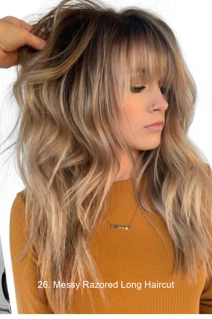 26. Messy Razored Long Haircut