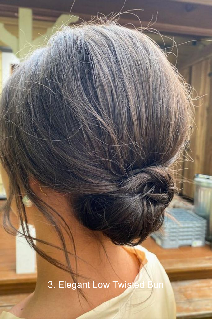 3. Elegant Low Twisted Bun