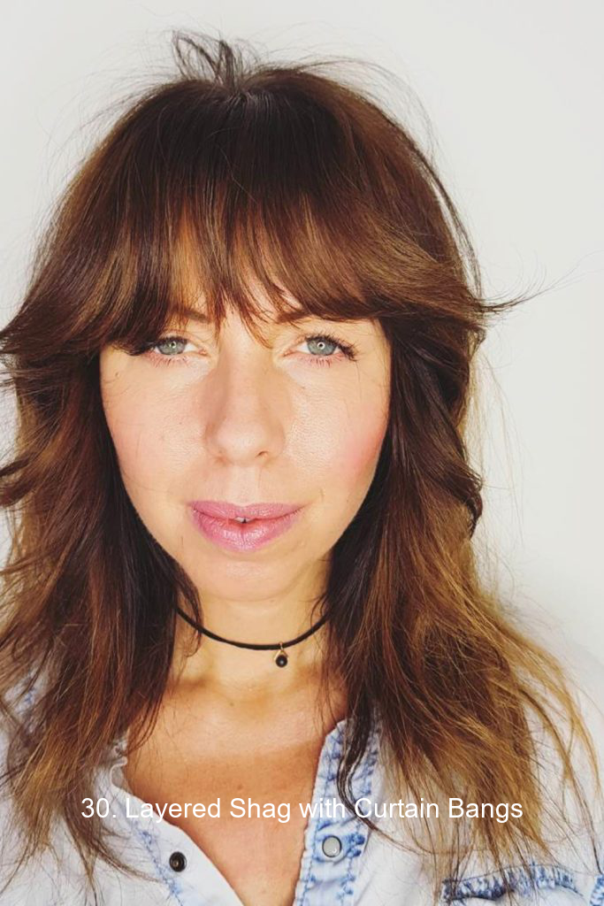 30. Layered Shag with Curtain Bangs