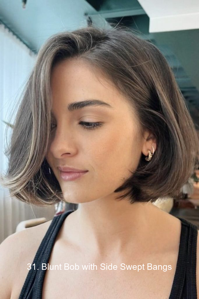 31. Blunt Bob with Side Swept Bangs