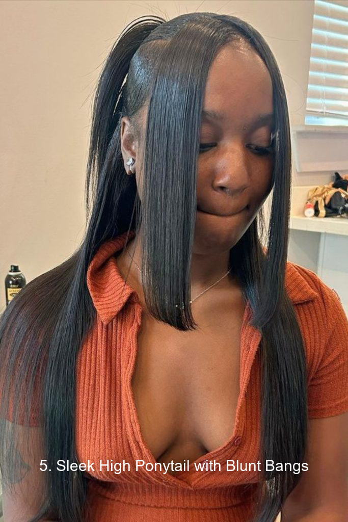 5. Sleek High Ponytail with Blunt Bangs