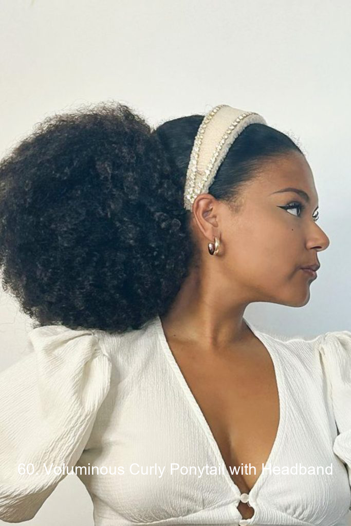 60. Voluminous Curly Ponytail with Headband