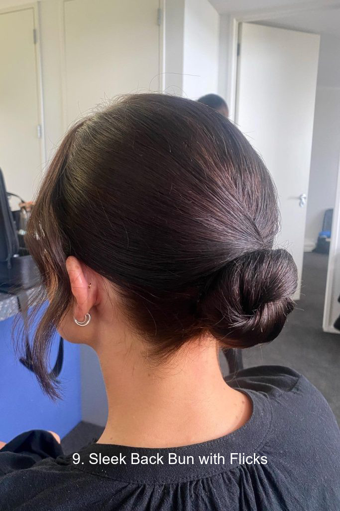 9. Sleek Back Bun with Flicks
